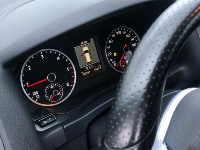 Синий Фольксваген Тигуан, объемом двигателя 2 л и пробегом 180 тыс. км за 5800 $, фото 12 на Automoto.ua