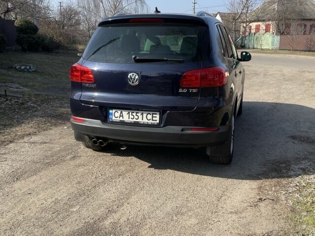Синий Фольксваген Тигуан, объемом двигателя 2 л и пробегом 203 тыс. км за 13700 $, фото 2 на Automoto.ua