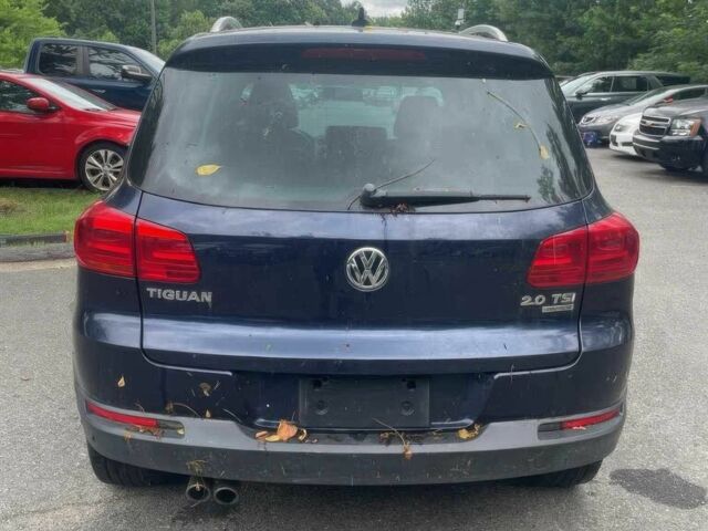 Синий Фольксваген Тигуан, объемом двигателя 2 л и пробегом 83 тыс. км за 2100 $, фото 4 на Automoto.ua