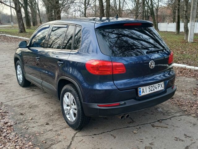 Синий Фольксваген Тигуан, объемом двигателя 2 л и пробегом 200 тыс. км за 11500 $, фото 2 на Automoto.ua