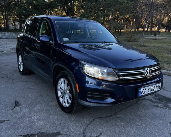 Синий Фольксваген Тигуан, объемом двигателя 2 л и пробегом 252 тыс. км за 9800 $, фото 1 на Automoto.ua