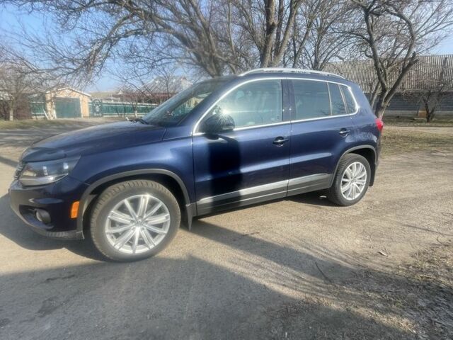 Синий Фольксваген Тигуан, объемом двигателя 2 л и пробегом 203 тыс. км за 13700 $, фото 1 на Automoto.ua