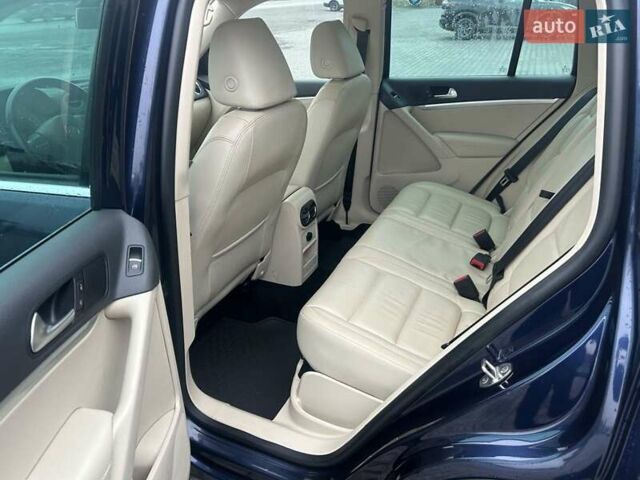 Синий Фольксваген Тигуан, объемом двигателя 2 л и пробегом 299 тыс. км за 12950 $, фото 18 на Automoto.ua