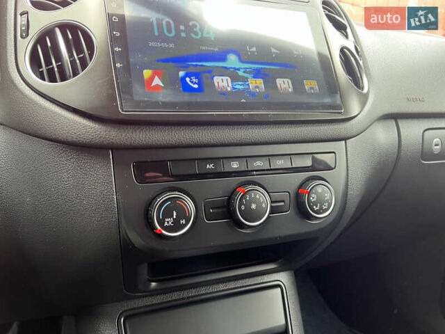 Синий Фольксваген Тигуан, объемом двигателя 2 л и пробегом 219 тыс. км за 12000 $, фото 14 на Automoto.ua