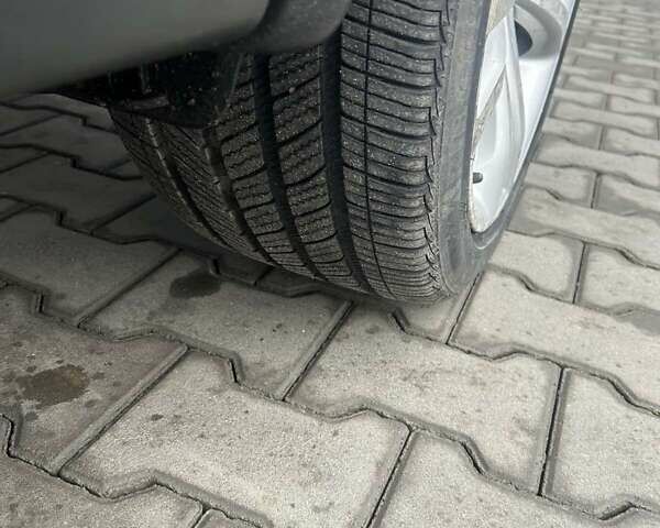 Синий Фольксваген Тигуан, объемом двигателя 2 л и пробегом 299 тыс. км за 12950 $, фото 9 на Automoto.ua