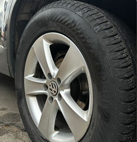 Синій Фольксваген Тігуан, об'ємом двигуна 2 л та пробігом 268 тис. км за 13917 $, фото 1 на Automoto.ua