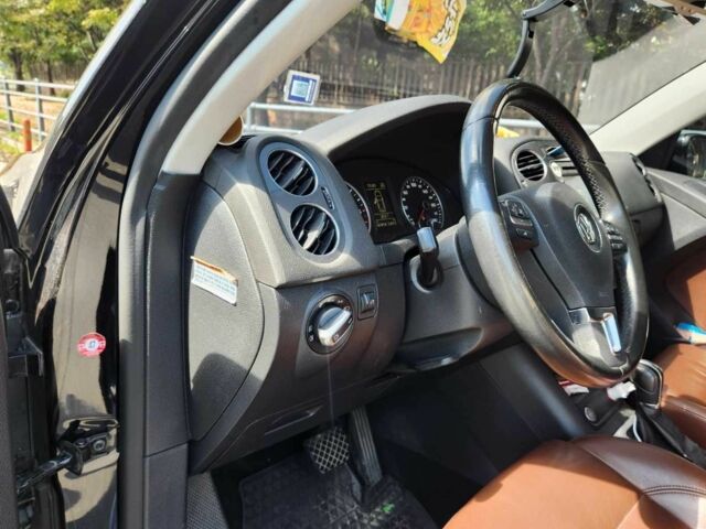 Синій Фольксваген Тігуан, об'ємом двигуна 2 л та пробігом 76 тис. км за 6955 $, фото 4 на Automoto.ua
