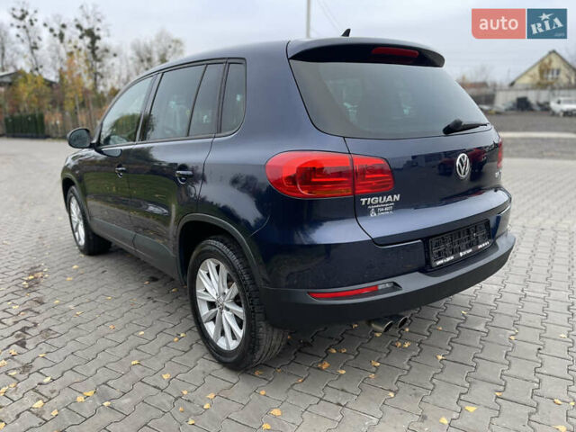 Синий Фольксваген Тигуан, объемом двигателя 2 л и пробегом 165 тыс. км за 11500 $, фото 4 на Automoto.ua