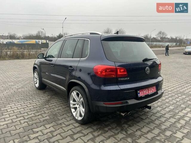 Синий Фольксваген Тигуан, объемом двигателя 2 л и пробегом 299 тыс. км за 12950 $, фото 2 на Automoto.ua