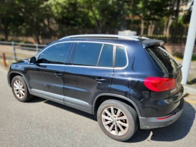 Синій Фольксваген Тігуан, об'ємом двигуна 2 л та пробігом 76 тис. км за 6955 $, фото 2 на Automoto.ua