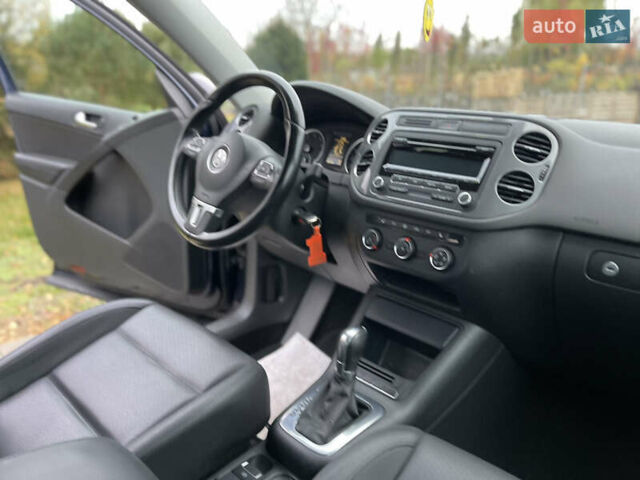 Синий Фольксваген Тигуан, объемом двигателя 2 л и пробегом 165 тыс. км за 11500 $, фото 16 на Automoto.ua