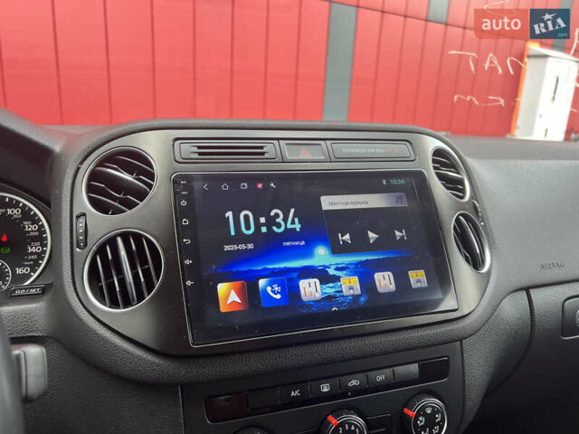 Синий Фольксваген Тигуан, объемом двигателя 2 л и пробегом 219 тыс. км за 12000 $, фото 13 на Automoto.ua