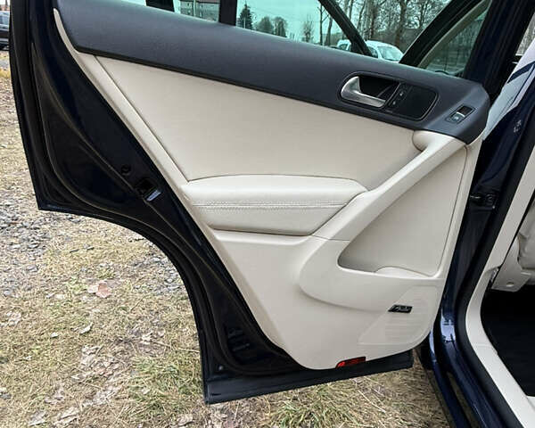 Синий Фольксваген Тигуан, объемом двигателя 1.98 л и пробегом 203 тыс. км за 12800 $, фото 26 на Automoto.ua