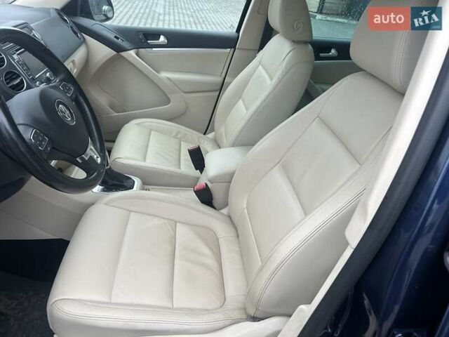 Синий Фольксваген Тигуан, объемом двигателя 2 л и пробегом 299 тыс. км за 12950 $, фото 15 на Automoto.ua