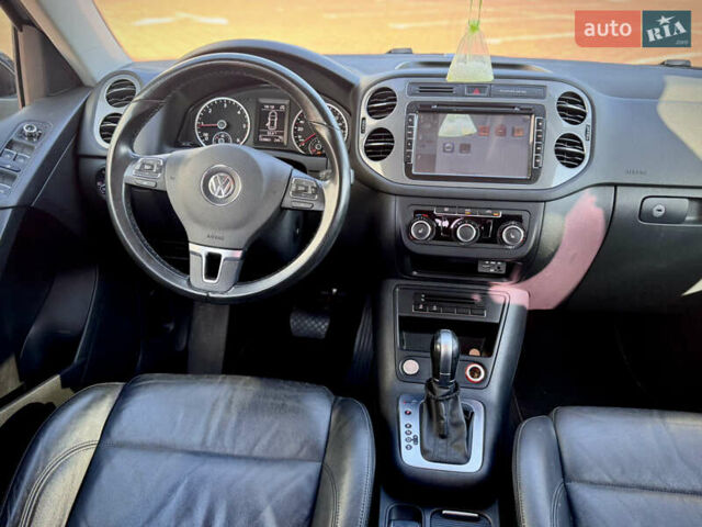 Синий Фольксваген Тигуан, объемом двигателя 2 л и пробегом 121 тыс. км за 16800 $, фото 46 на Automoto.ua