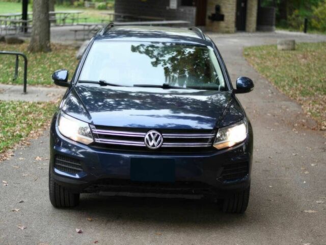 Синій Фольксваген Тігуан, об'ємом двигуна 2 л та пробігом 77 тис. км за 7700 $, фото 1 на Automoto.ua