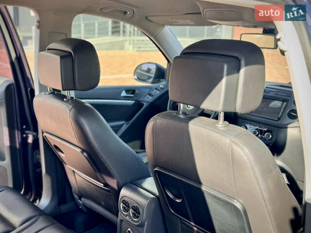 Синий Фольксваген Тигуан, объемом двигателя 2 л и пробегом 121 тыс. км за 16800 $, фото 54 на Automoto.ua