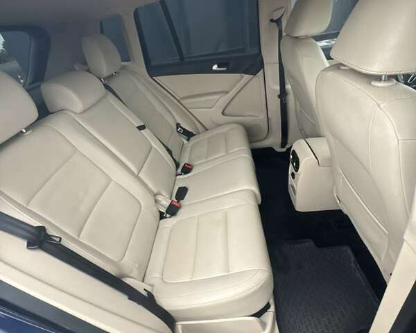 Синий Фольксваген Тигуан, объемом двигателя 1.98 л и пробегом 130 тыс. км за 12500 $, фото 24 на Automoto.ua