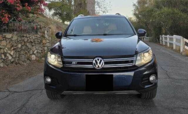 Синій Фольксваген Тігуан, об'ємом двигуна 2 л та пробігом 110 тис. км за 3000 $, фото 4 на Automoto.ua