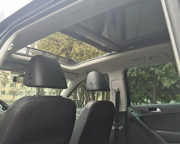 Синий Фольксваген Тигуан, объемом двигателя 1.98 л и пробегом 143 тыс. км за 15000 $, фото 22 на Automoto.ua