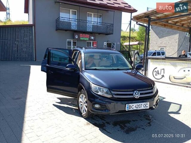 Синій Фольксваген Тігуан, об'ємом двигуна 1.98 л та пробігом 250 тис. км за 14000 $, фото 17 на Automoto.ua