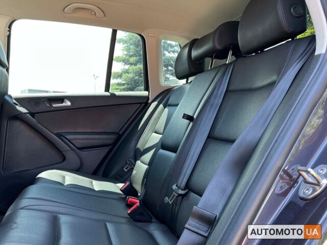 Синій Фольксваген Тігуан, об'ємом двигуна 2 л та пробігом 147 тис. км за 13800 $, фото 9 на Automoto.ua