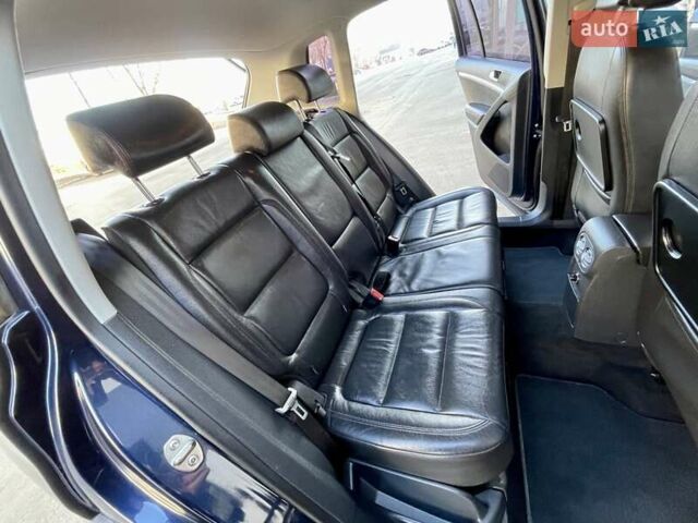 Синий Фольксваген Тигуан, объемом двигателя 2 л и пробегом 165 тыс. км за 16200 $, фото 47 на Automoto.ua