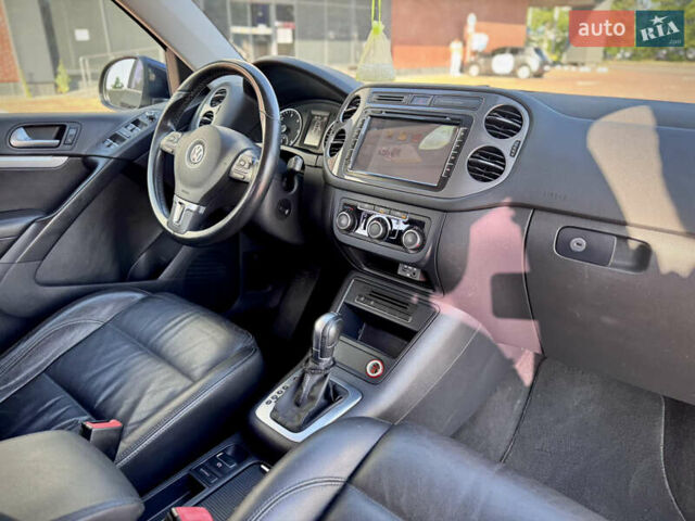 Синий Фольксваген Тигуан, объемом двигателя 2 л и пробегом 121 тыс. км за 16800 $, фото 64 на Automoto.ua
