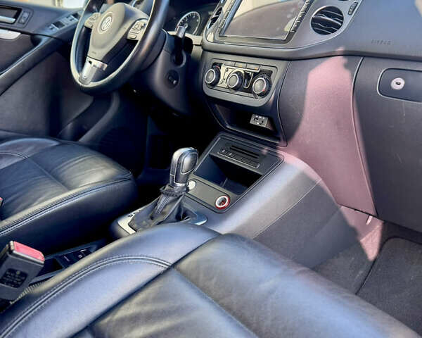 Синий Фольксваген Тигуан, объемом двигателя 2 л и пробегом 121 тыс. км за 16800 $, фото 65 на Automoto.ua