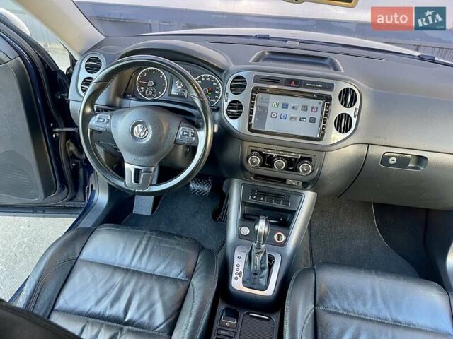 Синий Фольксваген Тигуан, объемом двигателя 2 л и пробегом 165 тыс. км за 16200 $, фото 56 на Automoto.ua