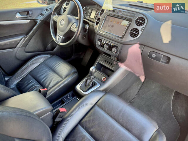 Синий Фольксваген Тигуан, объемом двигателя 2 л и пробегом 121 тыс. км за 16800 $, фото 66 на Automoto.ua