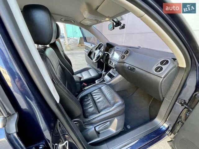 Синий Фольксваген Тигуан, объемом двигателя 2 л и пробегом 165 тыс. км за 16200 $, фото 51 на Automoto.ua