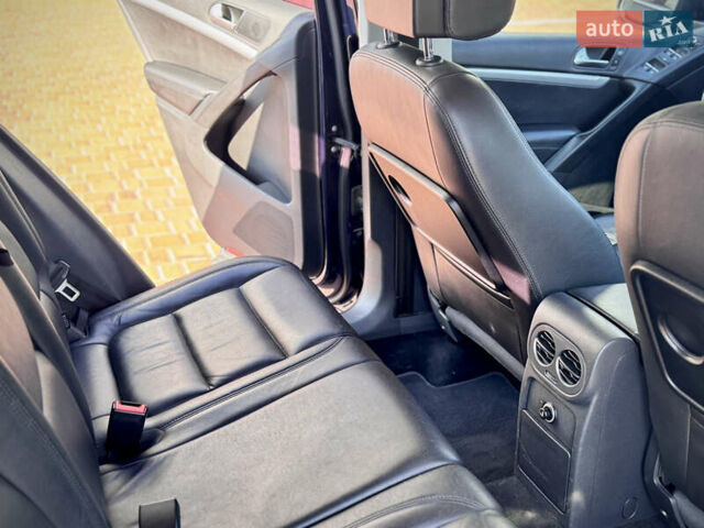 Синий Фольксваген Тигуан, объемом двигателя 2 л и пробегом 121 тыс. км за 16800 $, фото 62 на Automoto.ua