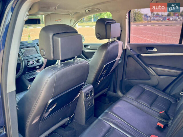 Синий Фольксваген Тигуан, объемом двигателя 2 л и пробегом 121 тыс. км за 16800 $, фото 48 на Automoto.ua