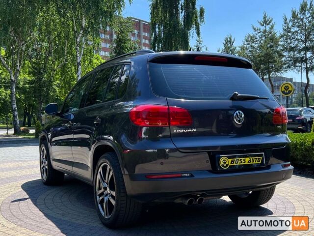Синій Фольксваген Тігуан, об'ємом двигуна 2 л та пробігом 147 тис. км за 13800 $, фото 4 на Automoto.ua