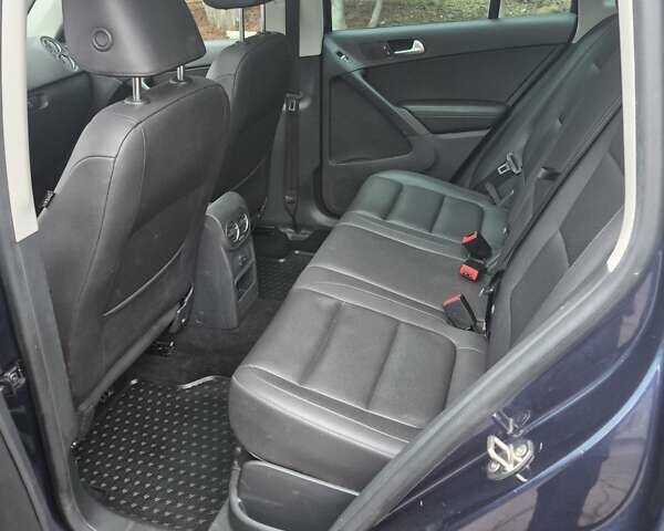 Синий Фольксваген Тигуан, объемом двигателя 1.98 л и пробегом 143 тыс. км за 15000 $, фото 18 на Automoto.ua