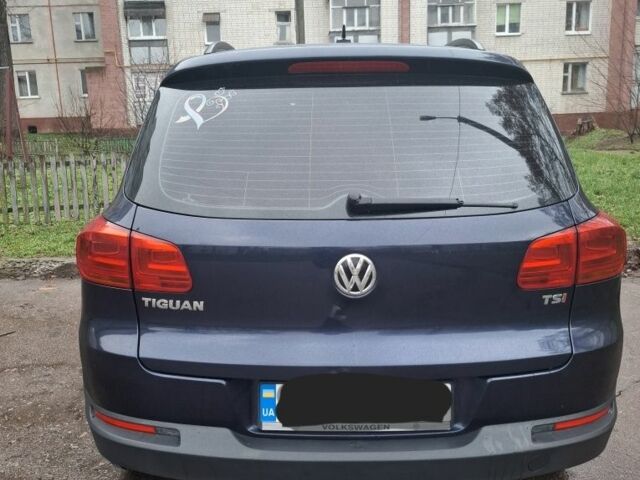 Синій Фольксваген Тігуан, об'ємом двигуна 2 л та пробігом 208 тис. км за 13500 $, фото 1 на Automoto.ua