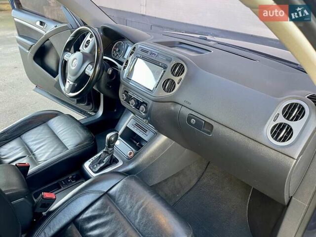 Синий Фольксваген Тигуан, объемом двигателя 2 л и пробегом 165 тыс. км за 16200 $, фото 54 на Automoto.ua