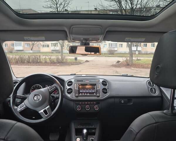 Синий Фольксваген Тигуан, объемом двигателя 1.98 л и пробегом 143 тыс. км за 15000 $, фото 17 на Automoto.ua