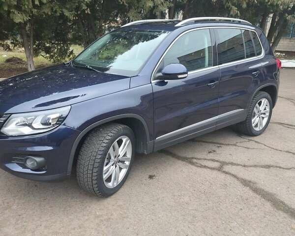Синий Фольксваген Тигуан, объемом двигателя 1.98 л и пробегом 143 тыс. км за 15000 $, фото 2 на Automoto.ua