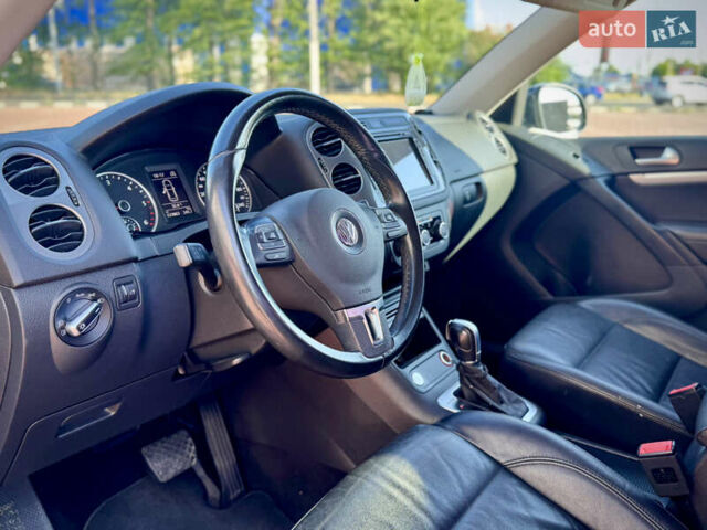 Синий Фольксваген Тигуан, объемом двигателя 2 л и пробегом 121 тыс. км за 16800 $, фото 41 на Automoto.ua