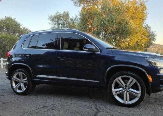 Синій Фольксваген Тігуан, об'ємом двигуна 2 л та пробігом 110 тис. км за 3000 $, фото 6 на Automoto.ua