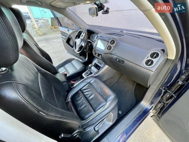 Синий Фольксваген Тигуан, объемом двигателя 2 л и пробегом 165 тыс. км за 16200 $, фото 53 на Automoto.ua