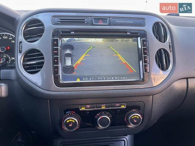 Синий Фольксваген Тигуан, объемом двигателя 2 л и пробегом 165 тыс. км за 16200 $, фото 63 на Automoto.ua