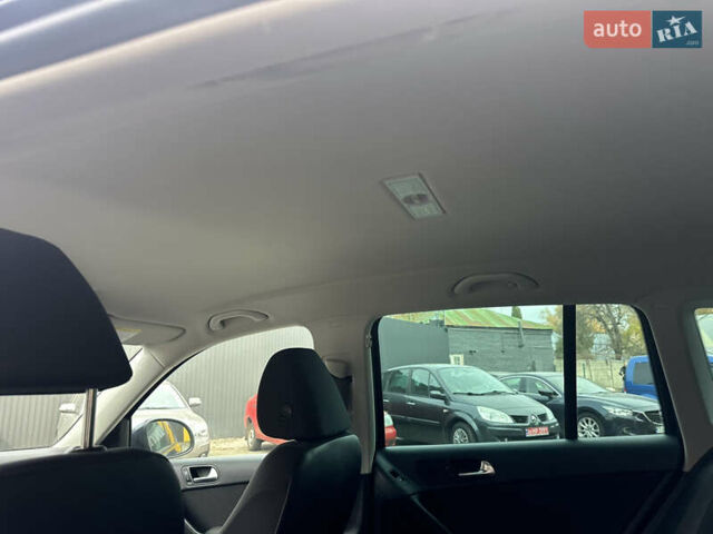 Синій Фольксваген Тігуан, об'ємом двигуна 2 л та пробігом 139 тис. км за 13500 $, фото 34 на Automoto.ua