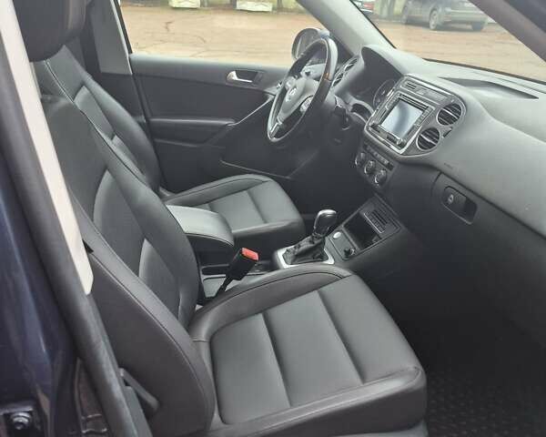 Синий Фольксваген Тигуан, объемом двигателя 1.98 л и пробегом 143 тыс. км за 15000 $, фото 14 на Automoto.ua