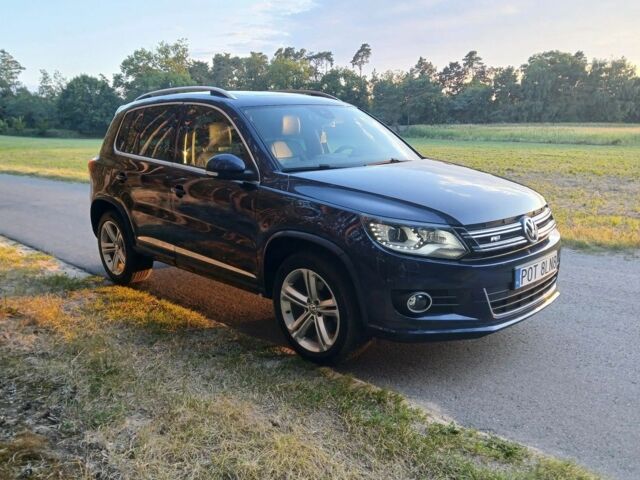 Синий Фольксваген Тигуан, объемом двигателя 2 л и пробегом 174 тыс. км за 8500 $, фото 1 на Automoto.ua