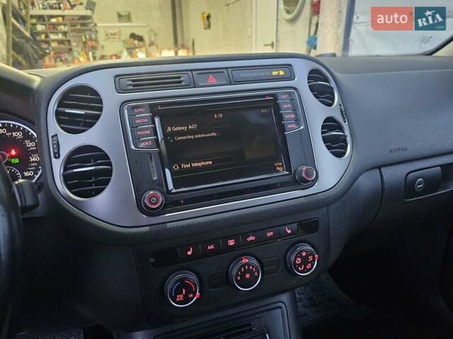 Синий Фольксваген Тигуан, объемом двигателя 2 л и пробегом 152 тыс. км за 10700 $, фото 20 на Automoto.ua