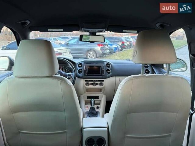 Синий Фольксваген Тигуан, объемом двигателя 2 л и пробегом 129 тыс. км за 14100 $, фото 32 на Automoto.ua