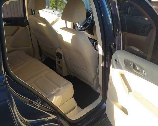 Синій Фольксваген Тігуан, об'ємом двигуна 0 л та пробігом 98 тис. км за 14500 $, фото 19 на Automoto.ua